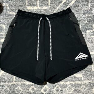 Four Nike trail running shorts. 5” inseam. $45 each or $140 for all four